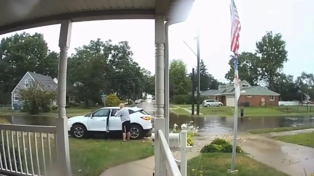 Elderly Michigan Homeowner Clashes With Driver Who Drove SUV Across His Lawn to Get Around Flooded Residential Road