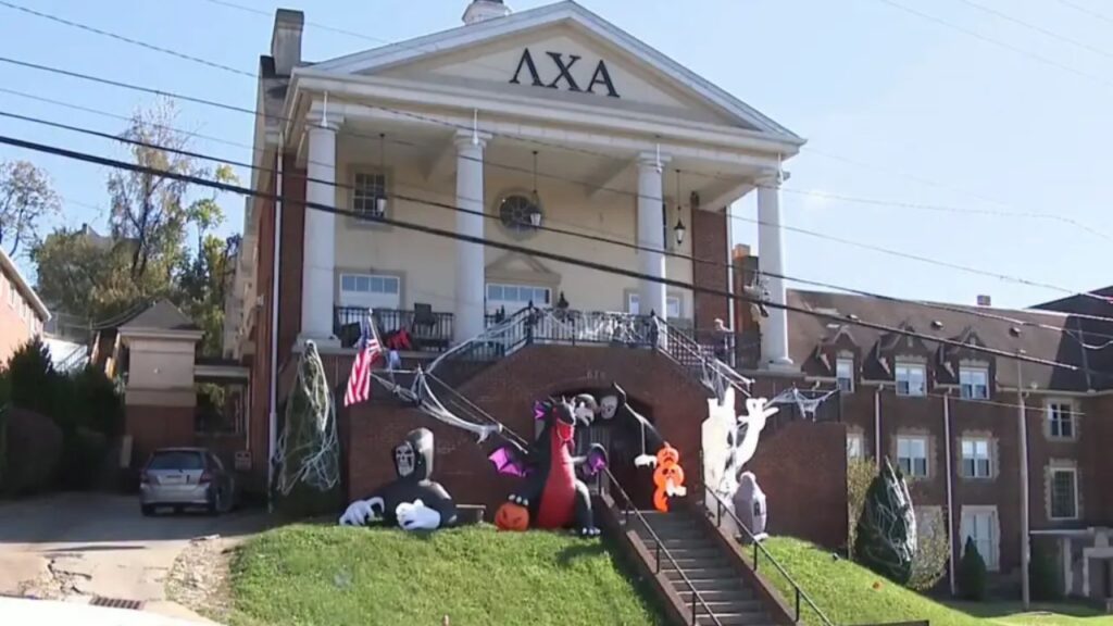 Police Raid Two West Virginia University Fraternity Houses in Hazing Probe as Hundreds of Students Watch